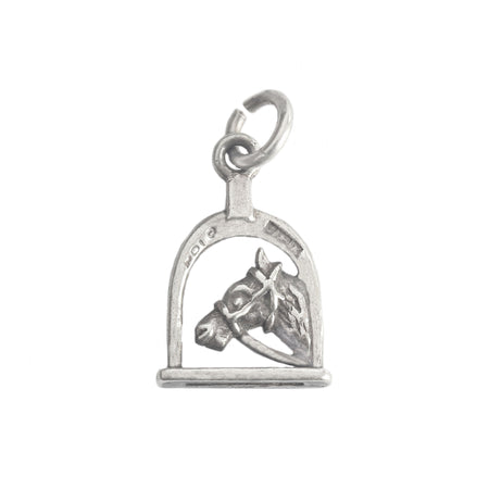 a vintage silver horse head stirrup charm