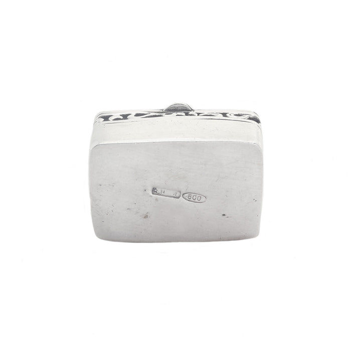 underneath of a silver rectangular box hallmark