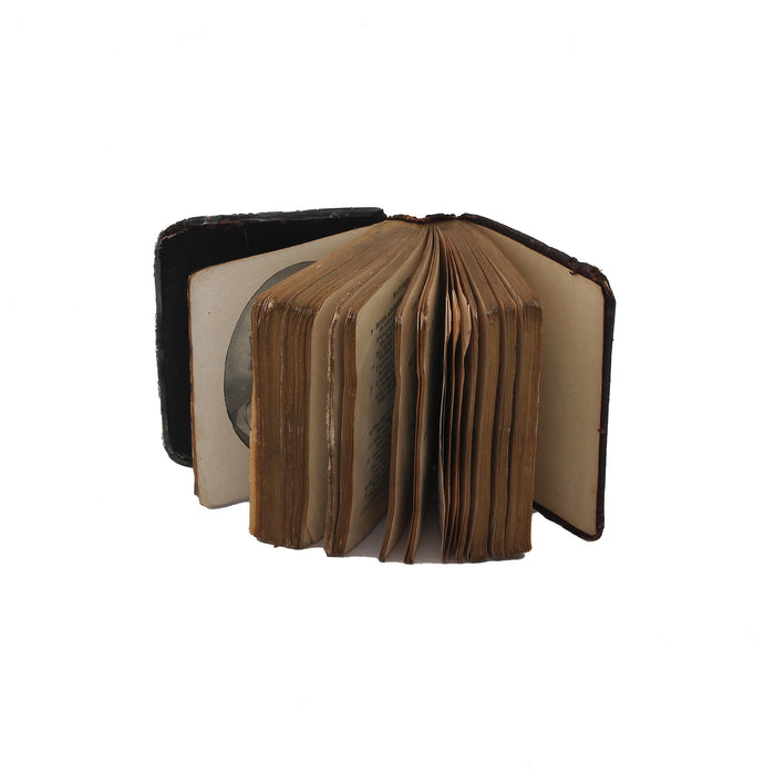 a miniature book hymns showing pages