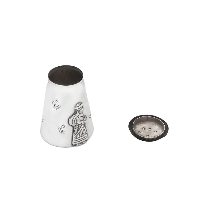 a vintage silver pepper shaker gentleman design