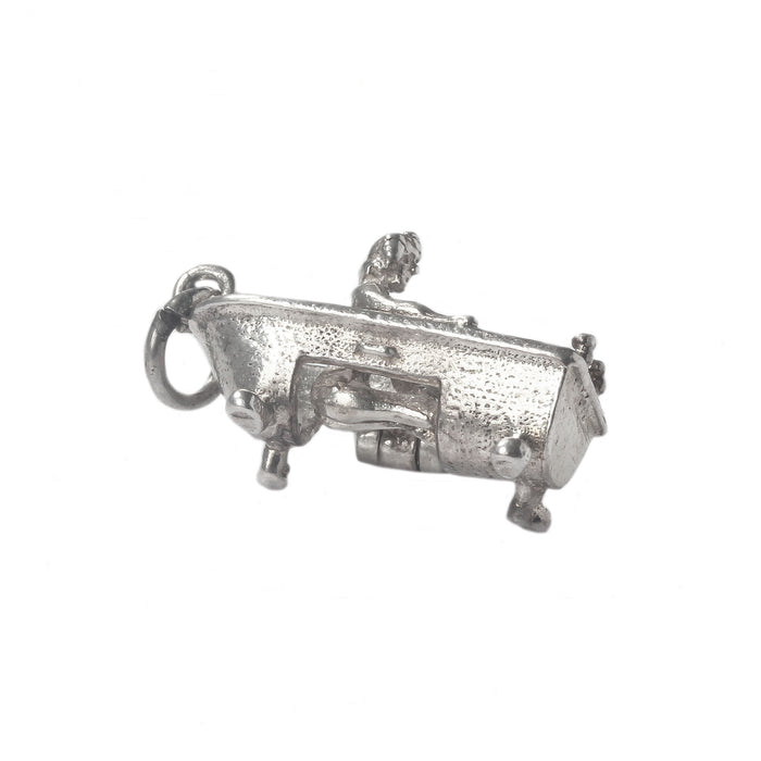 a vintage silver bath with woman in 
