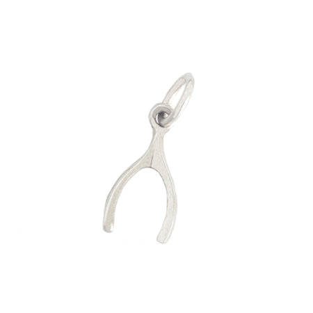 a vintage sterling silver wishbone charm