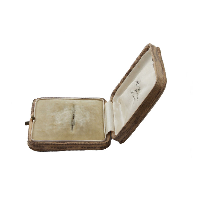 a hinged opened jewellery display box brooch