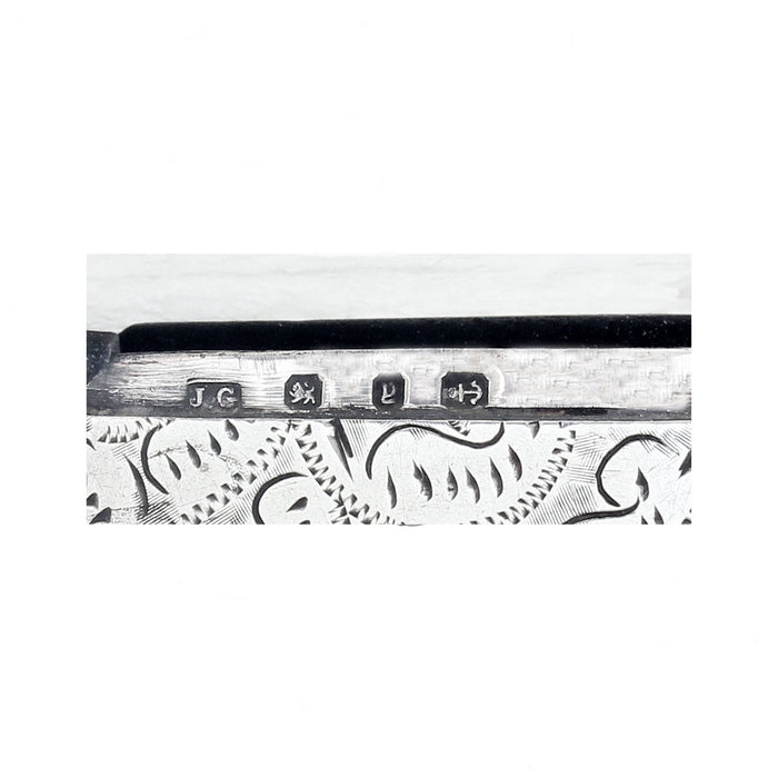 a silver hallmark close up with pattern
