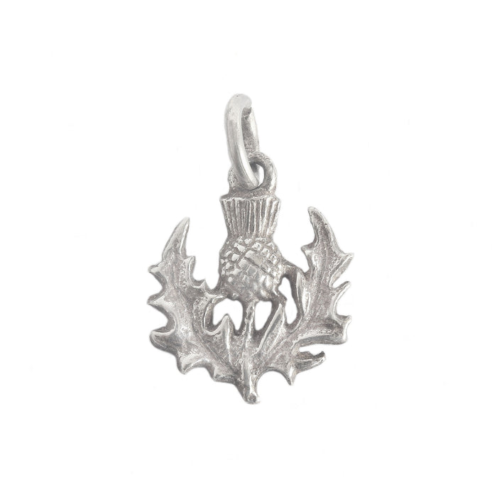 a sterling silver vintage thistle charm