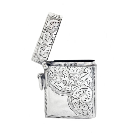 an engraved silver vesta case dated 1898