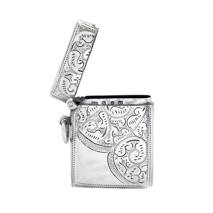 an engraved silver vesta case dated 1898