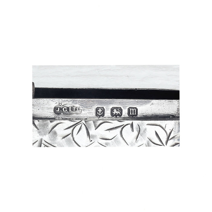 a close up photo of a silver hallmark