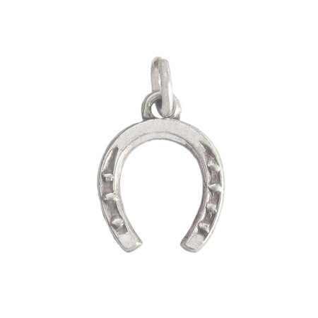 a vintage preowned silver horseshoe charm