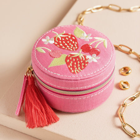 embroidered strawberry pink round jewellery case with zip and tassle
