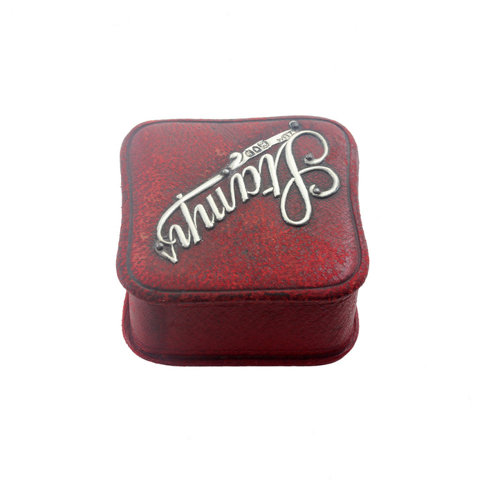 red square stamp box with silver hallmark