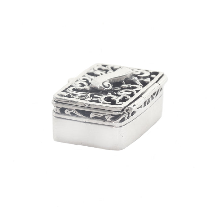 a vintage silver rectangle box cut out top hinged