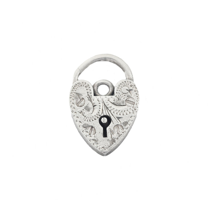 a vintage silver engraved padlock
