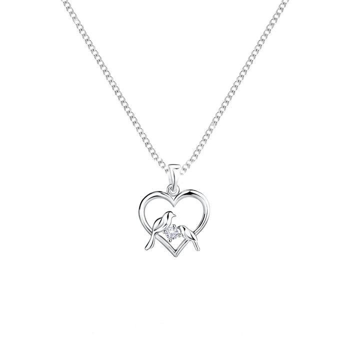 a pair of love birds sitting in a heart border on a curb chain all in silver