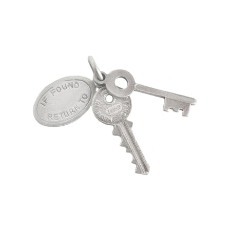 a vintage silver set of keys charm