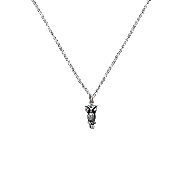 sitting owl pendant on a silver chain spiga link