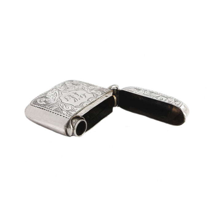 a scroll design silver opened vesta case